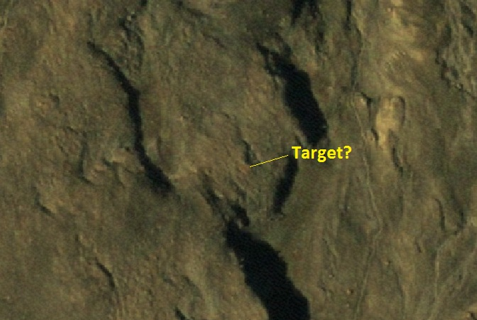 satellite orthophoto showing poor satellite ground target Figure 5b: The exact location of the target is not clear on the 50cm satellite photo because the orange colour blends into the brown background. A white target would have been more effective.