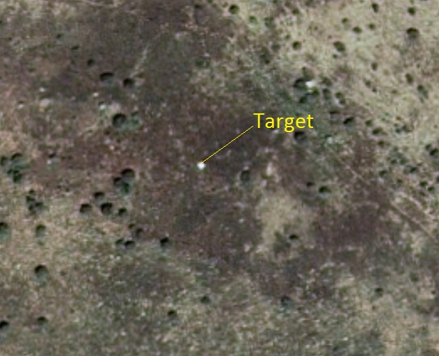 satellite orthophoto showing clear ground target Figure 4b: The target is visible on the 50cm resolution satellite image. The center of the target is difficult to locate within 25cm.